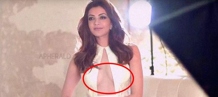 Oops ! <a class='inner-topic-link' href='/search/topic?searchType=search&searchTerm=KAJAL AGGARWAL' target='_blank' title='click here to read more about KAJAL AGGARWAL'>kajal aggarwal </a>EXPOSED her 'TOP' portion during Photoshoot